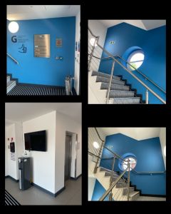 Office stairwell redecorated and relit as part of b2b commercial maintenance.