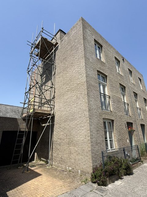 Scaffolding erected for residential building project